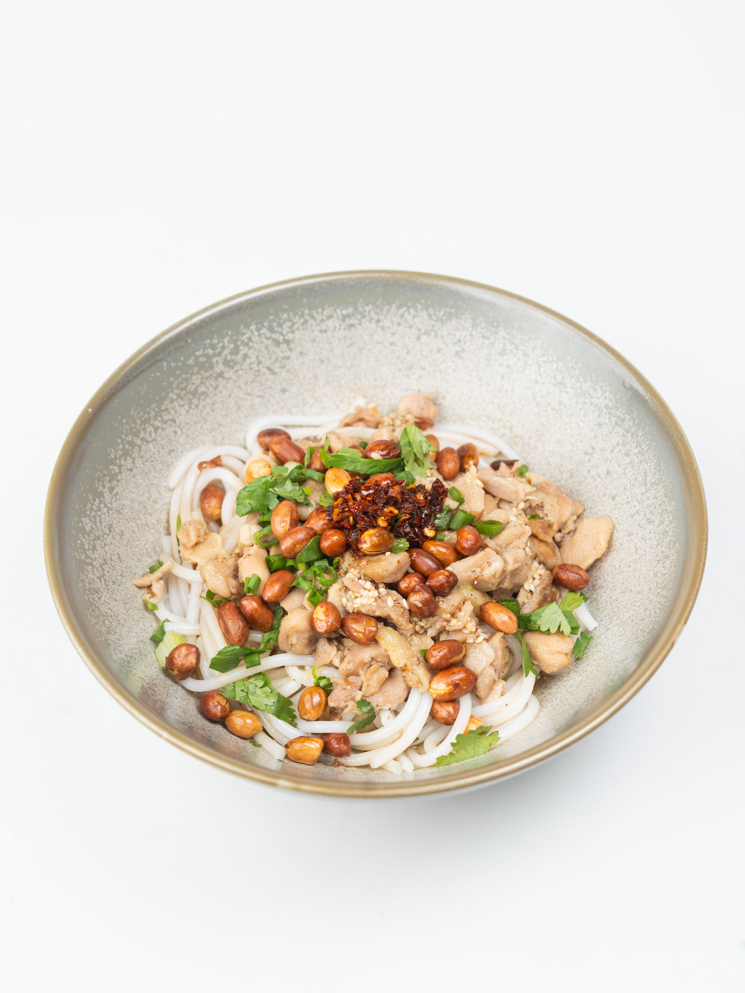 Signature Rice Noodles with chicken, peanuts, and fresh herbs